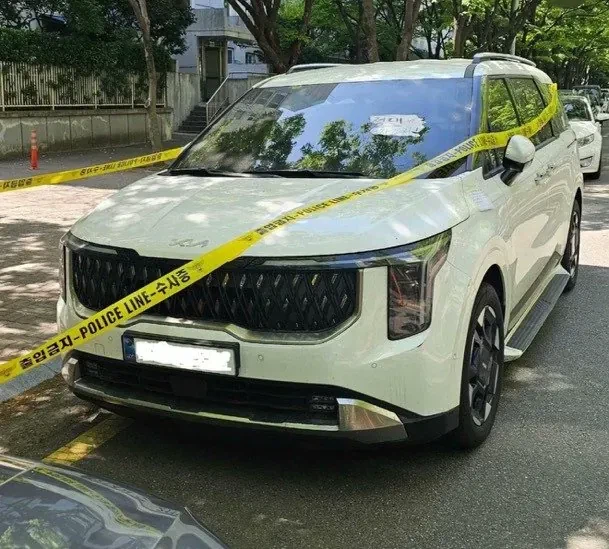 공짜 주차 하려고 과학수사 하는 것처럼 꾸며놓은 카니발